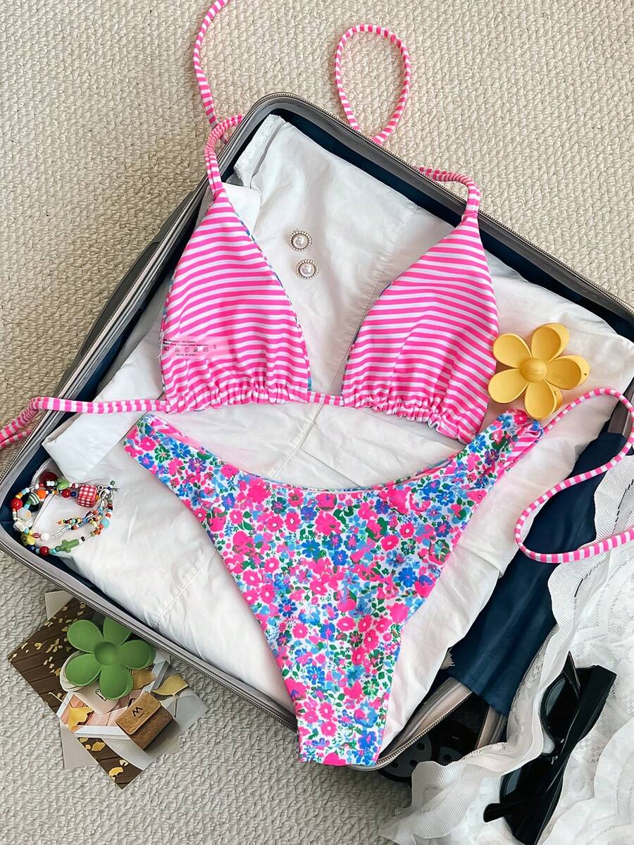 Women's two-piece halter bikini set featuring high cut thong bottoms and removable padding