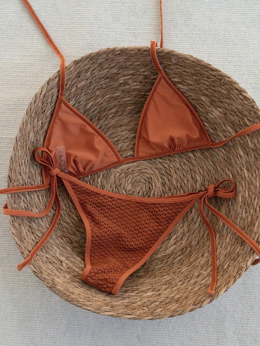 Women's apricot solid halter tie bikini top with triangle cups and matching tie-side swimsuit bottoms.