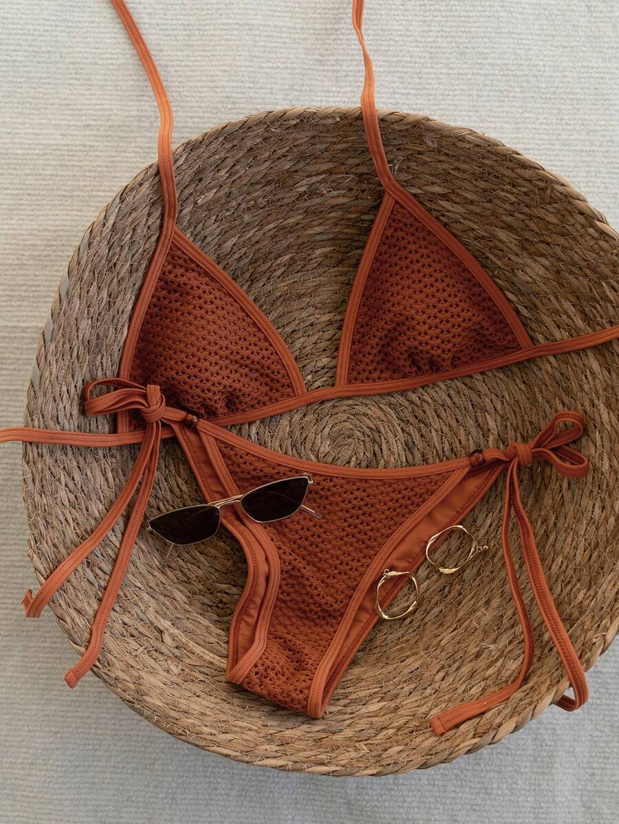 Women's apricot solid halter tie bikini top with triangle cups and matching tie-side swimsuit bottoms.
