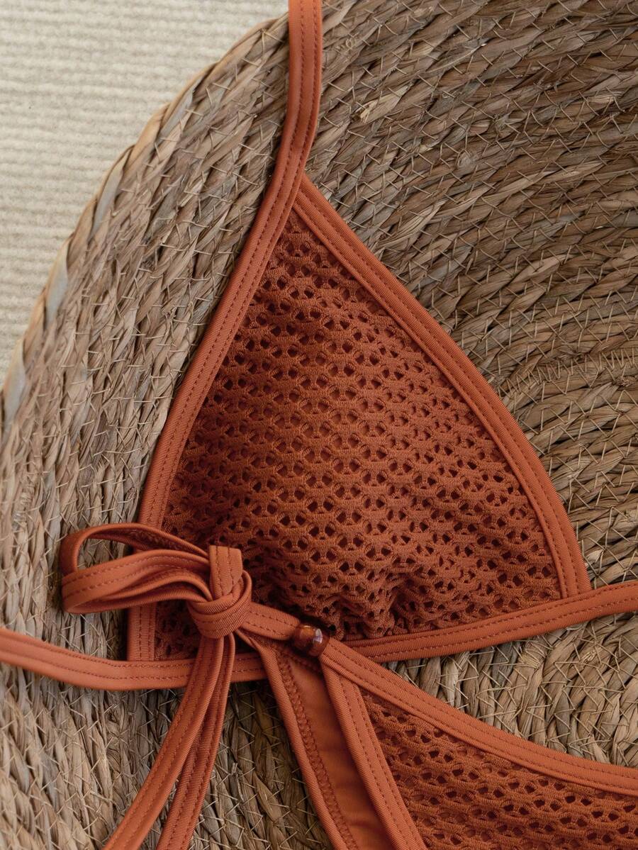 Women's apricot solid halter tie bikini top with triangle cups and matching tie-side swimsuit bottoms.