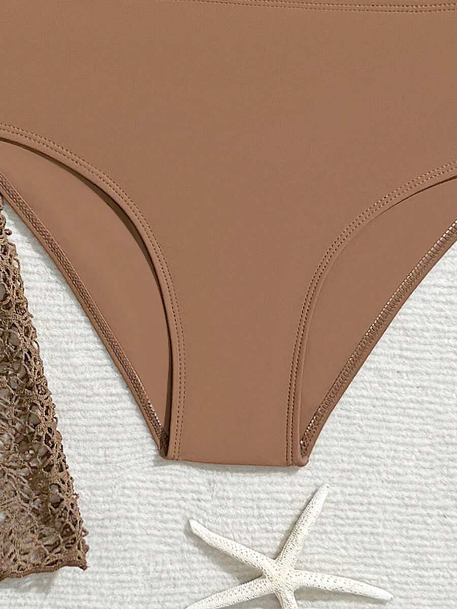 Tween girls beige bikini set with long sleeve round neck top, hollow-out asymmetrical details, mid-waist bottoms, and cover up for beach or vacation swimwear