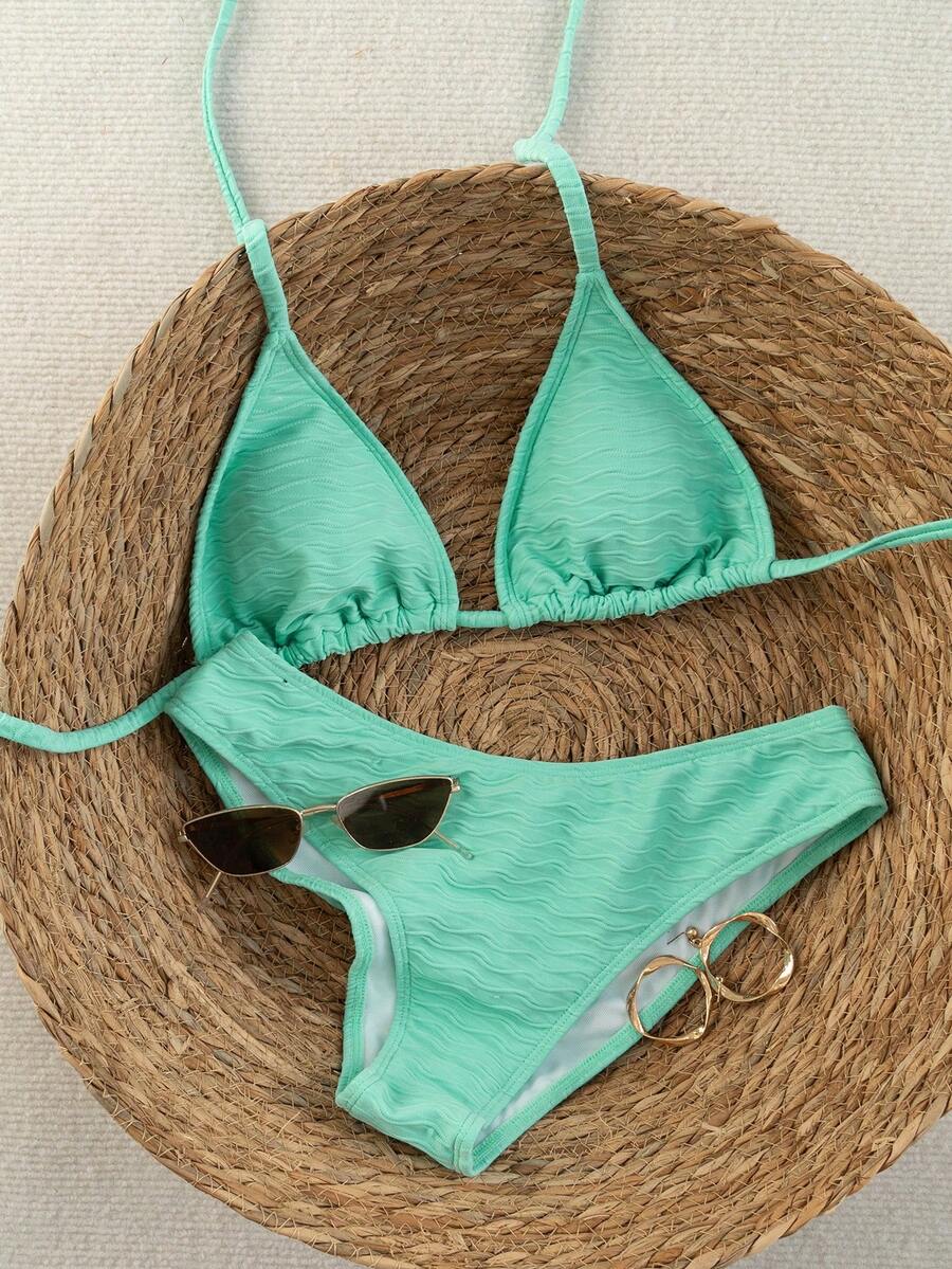 Women's apricot 2-piece halter bikini set featuring a wireless triangle top with tie-back detail and high-waisted high-cut bottoms.