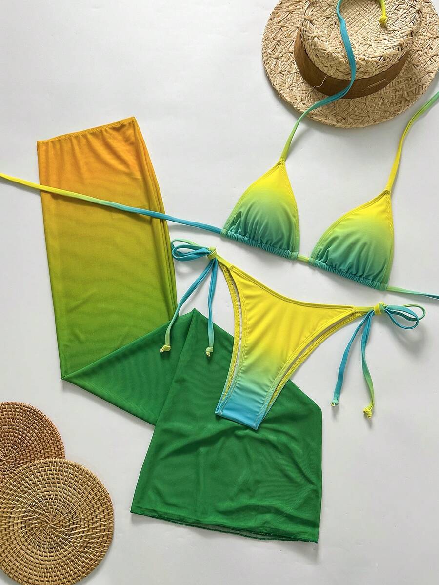Women's 3-piece gradient bikini set featuring a green halter tie top with removable padding, low waist bottoms, and a matching sheer mesh skirt.