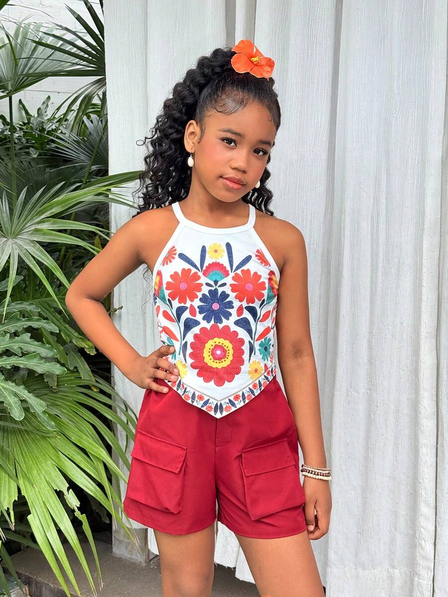 Girls 2-piece vacation outfit set with sleeveless halter knit crop top and graphic cargo shorts.