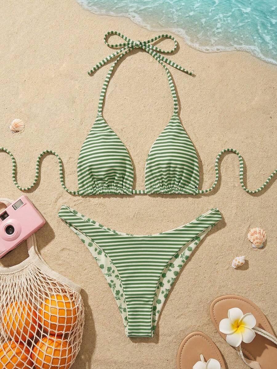 Women's two-piece halter bikini set featuring high cut thong bottoms and removable padding