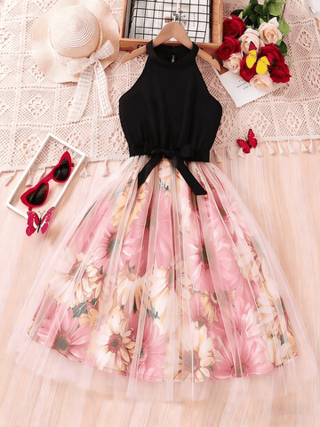 Tween girls black halter neck A-line dress featuring contrast mesh skirt with embroidery, high waist belted design, and flared long hem.