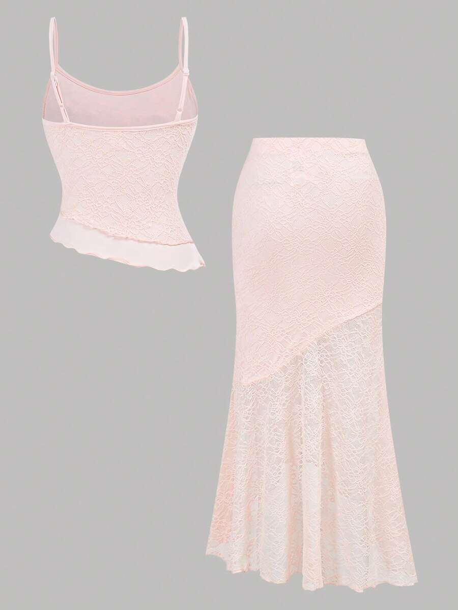 Tween girls blue 2-piece set featuring a short spaghetti strap lace tank top with asymmetrical lettuce trim and a long matching skirt.