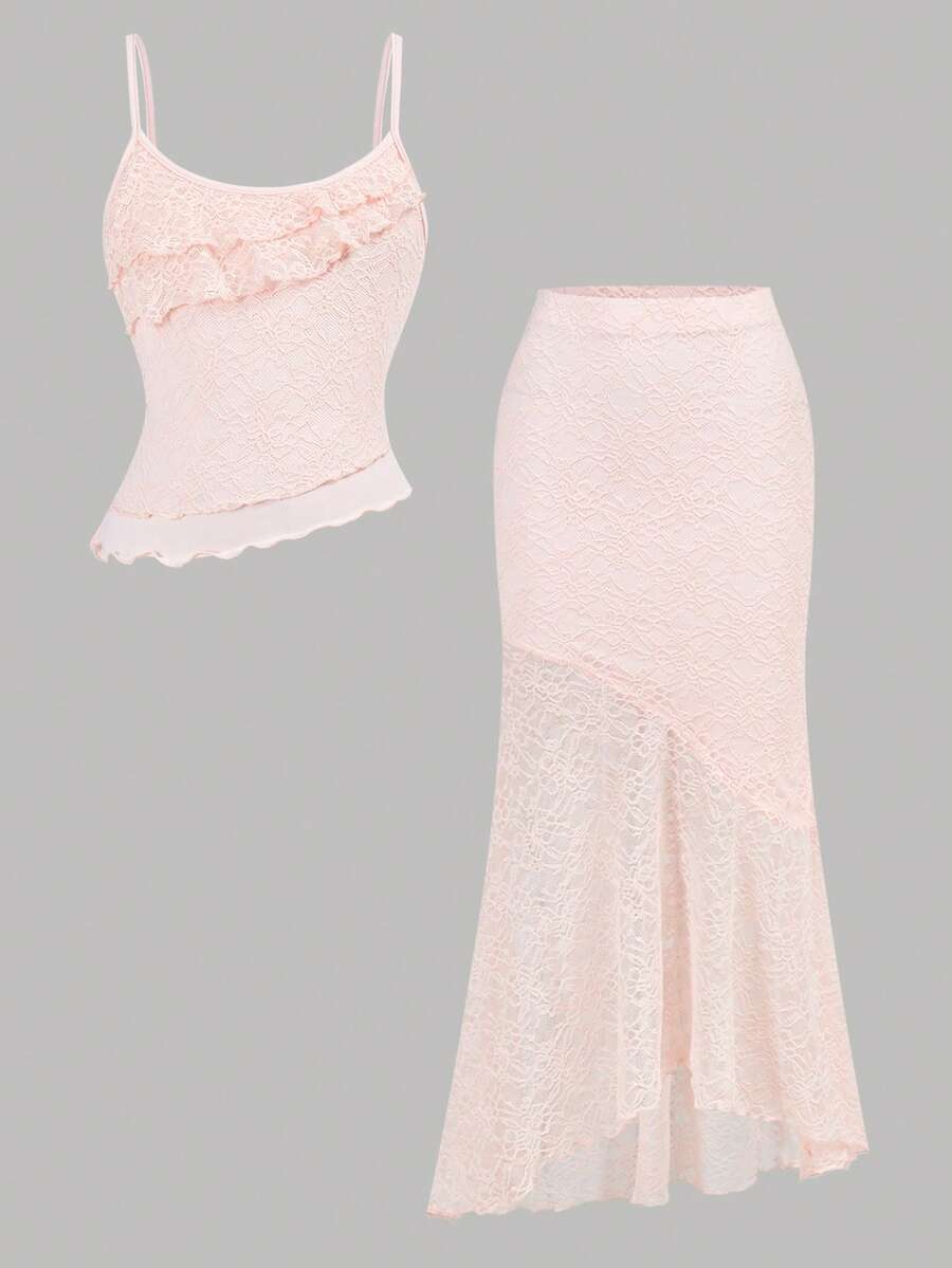 Tween girls blue 2-piece set featuring a short spaghetti strap lace tank top with asymmetrical lettuce trim and a long matching skirt.