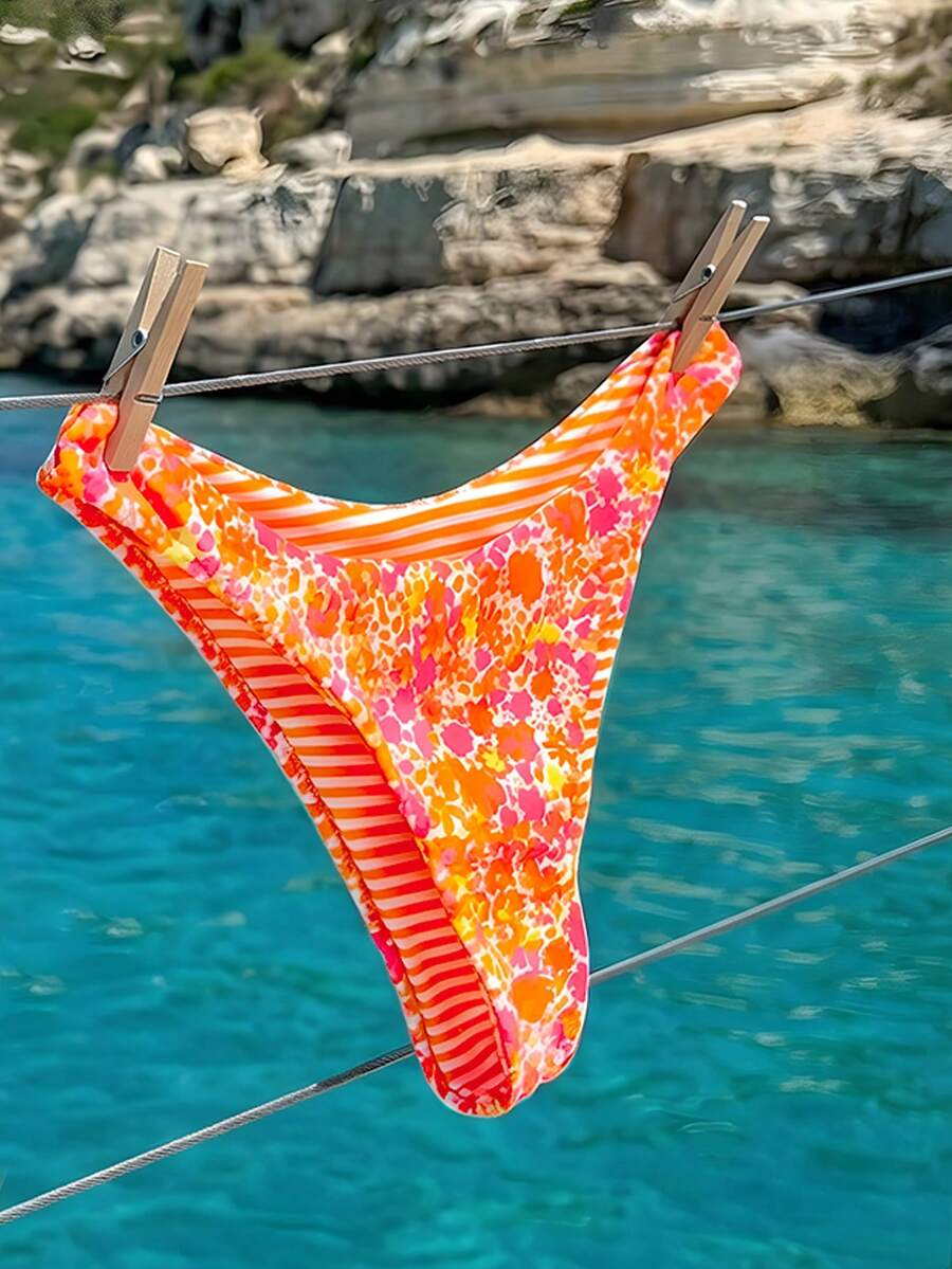 Women's two-piece halter bikini set featuring high cut thong bottoms and removable padding