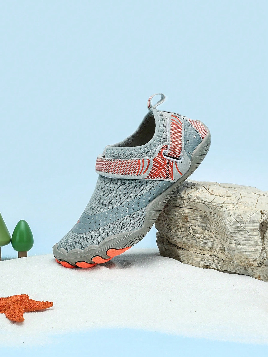 Boys grey breathable fabric water shoes featuring hook and loop closure and durable rubber sole.