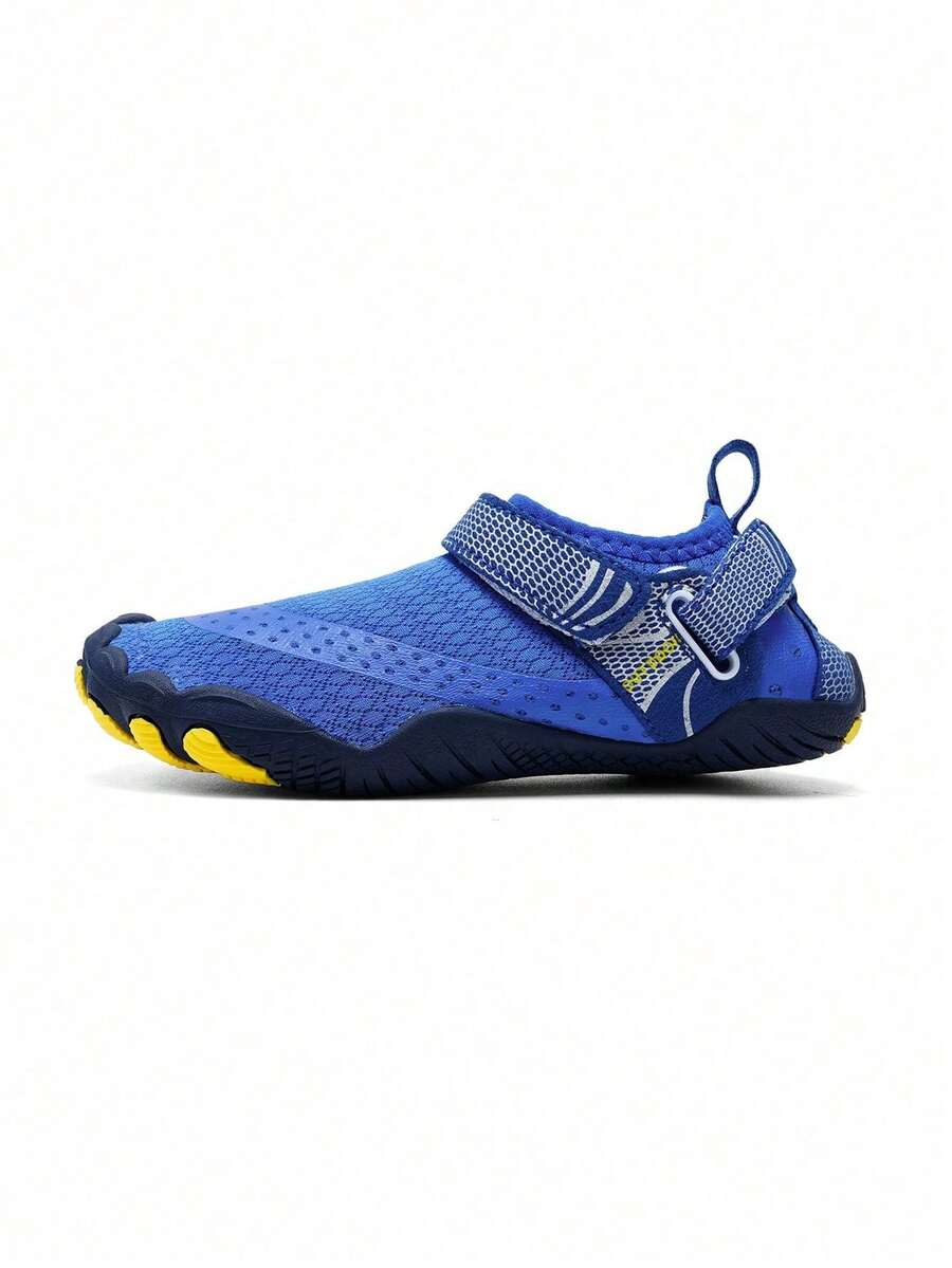 Boys grey breathable fabric water shoes featuring hook and loop closure and durable rubber sole.