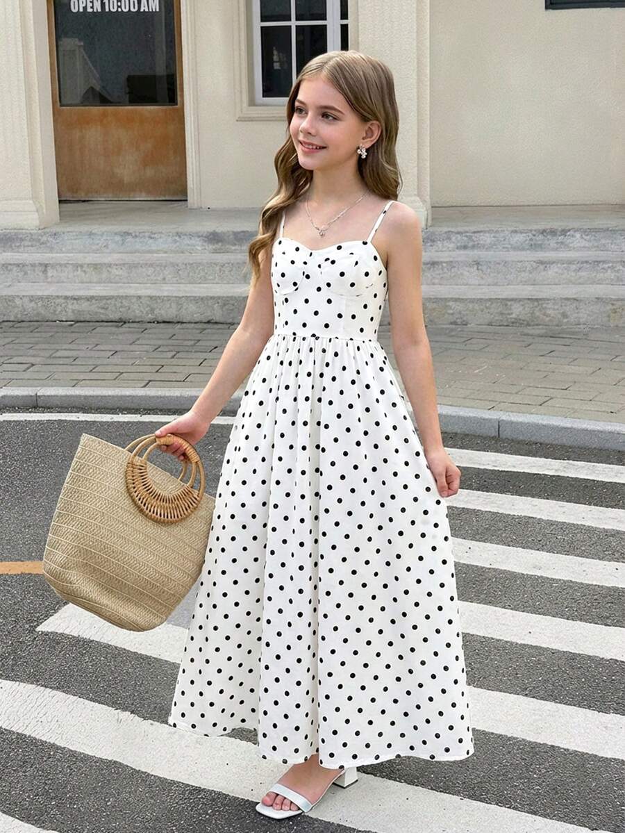 Tween girls apricot polka dot long cami dress with shoulder straps, high waist, and flared A-line skirt.