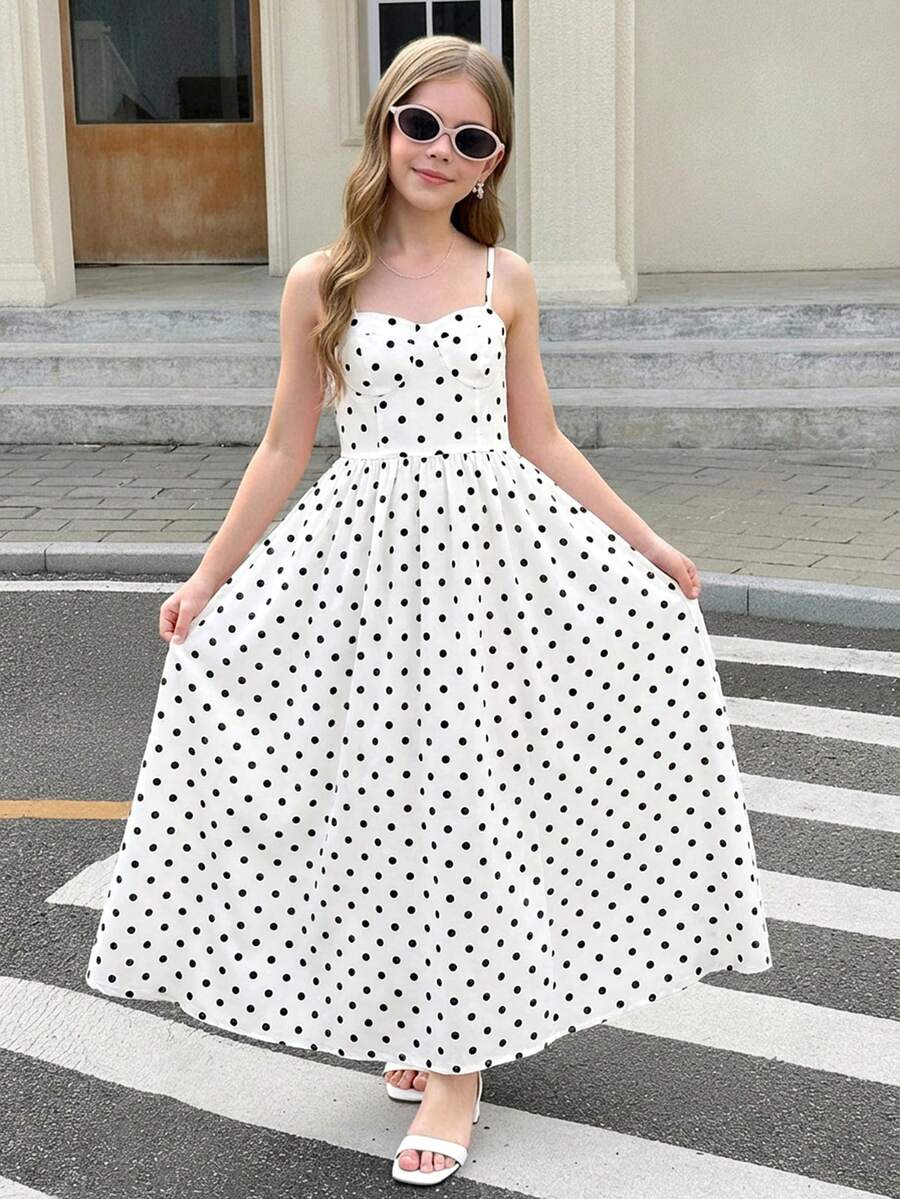 Tween girls apricot polka dot long cami dress with shoulder straps, high waist, and flared A-line skirt.