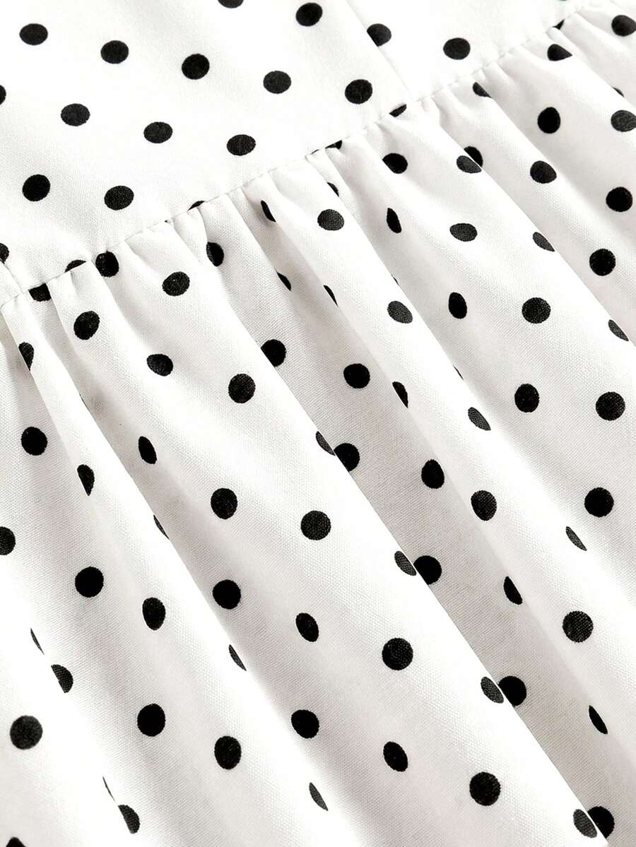Tween girls apricot polka dot long cami dress with shoulder straps, high waist, and flared A-line skirt.