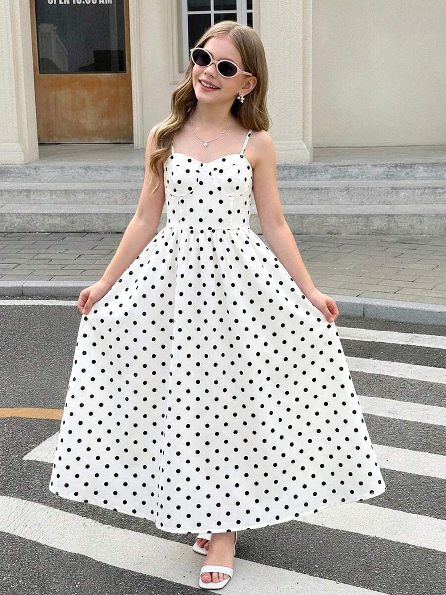 Tween girls apricot polka dot long cami dress with shoulder straps, high waist, and flared A-line skirt.