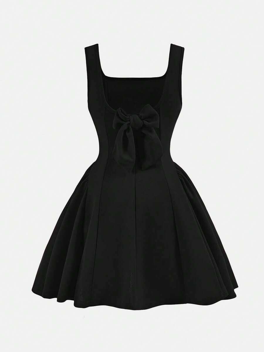 Apricot short-sleeve holiday party dress for tween girls featuring a square neckline, contrast lace details, high waist, flared A-line hem, and bowknot ruffle back detail.