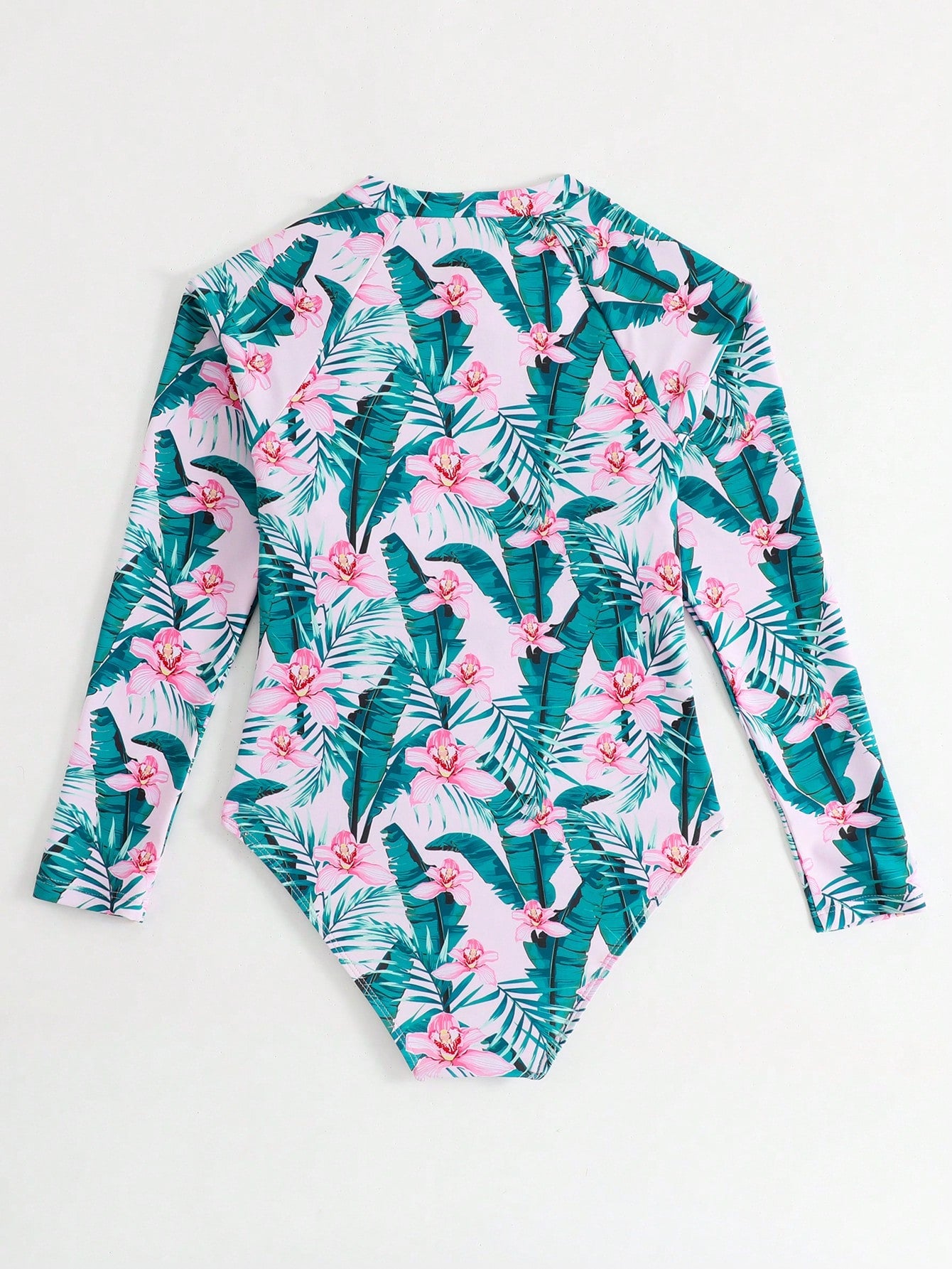 Girls one-piece swimsuit in blue with all-over leopard leaf print, ruffle detail, zipper front, high neck, and lined body for swimming and vacation.