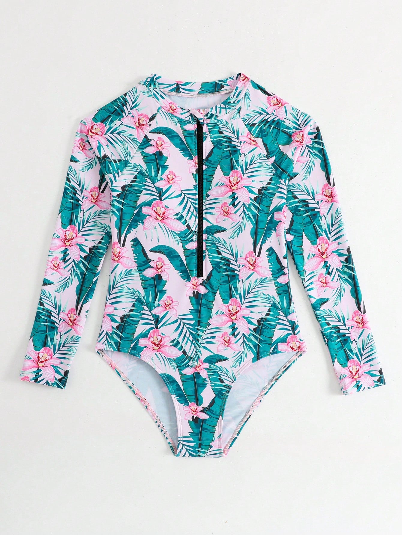Girls one-piece swimsuit in blue with all-over leopard leaf print, ruffle detail, zipper front, high neck, and lined body for swimming and vacation.