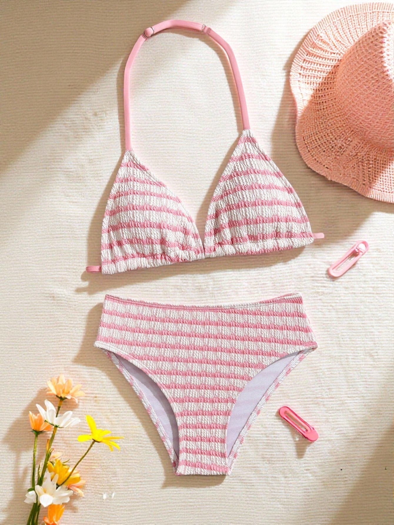 Tween girls blue and white striped two-piece bikini set with halter triangle top and mid-waist short bikini bottoms for beach and vacation swimwear.