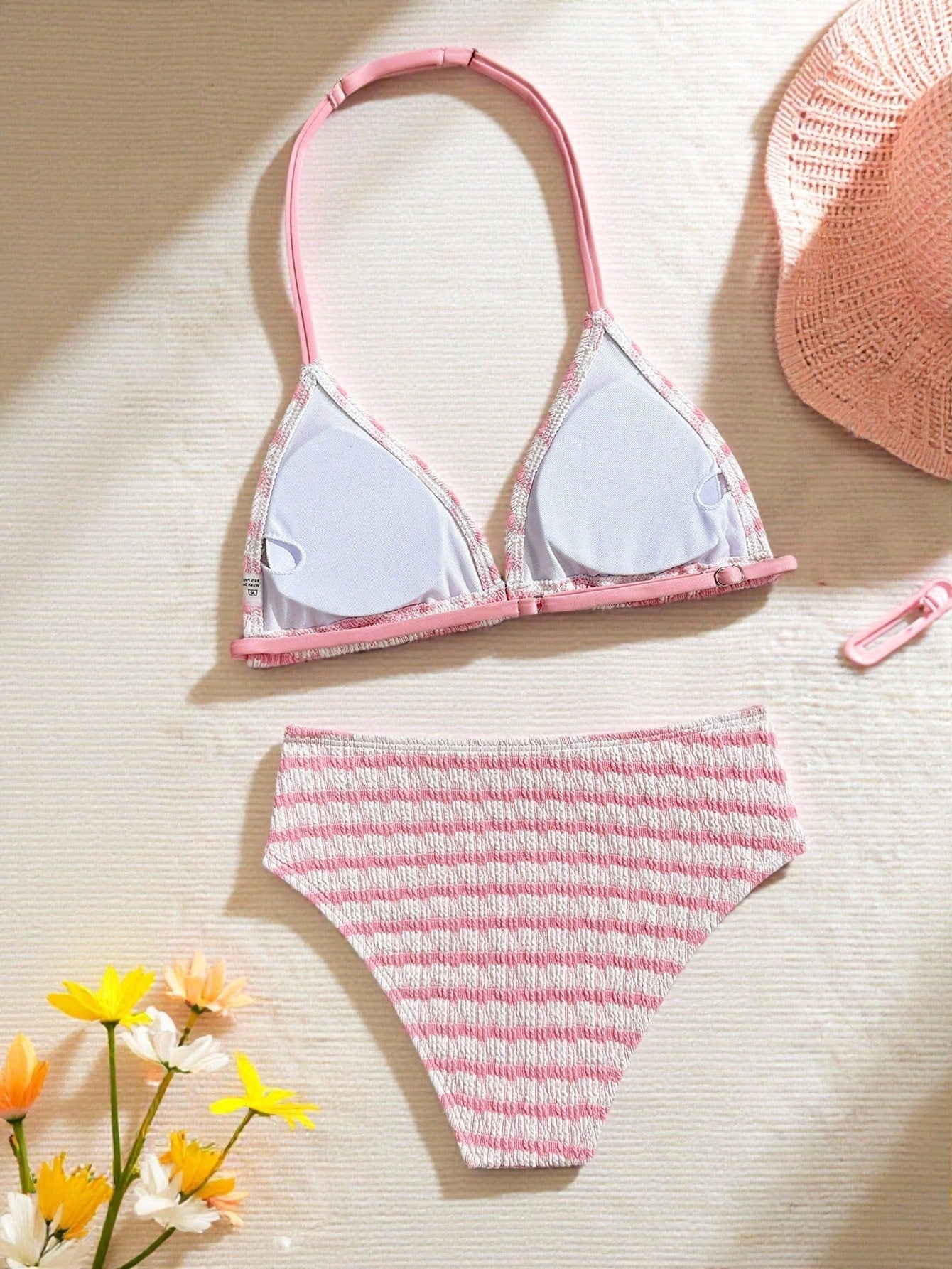 Tween girls blue and white striped two-piece bikini set with halter triangle top and mid-waist short bikini bottoms for beach and vacation swimwear.