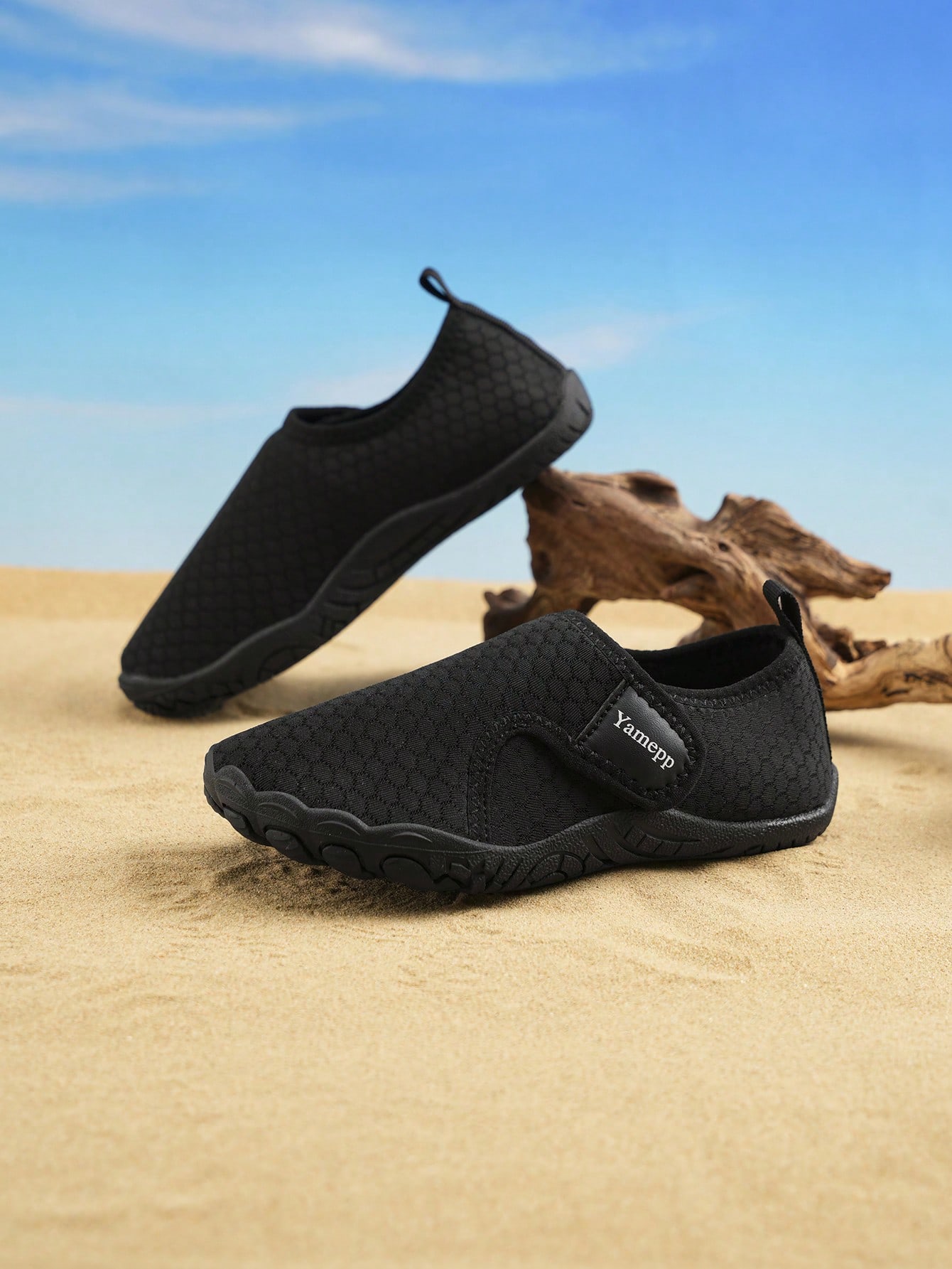 Kids breathable mesh water shoes with hook and loop closure and durable rubber outsole.