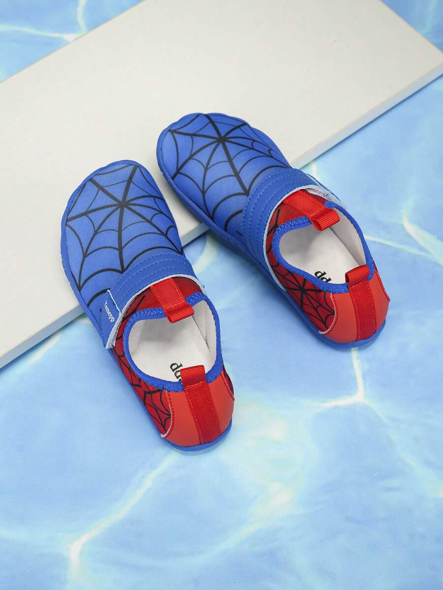 Pair of boys blue water shoes featuring a spider web mesh design, hook and loop strap, and non-slip rubber outsole.