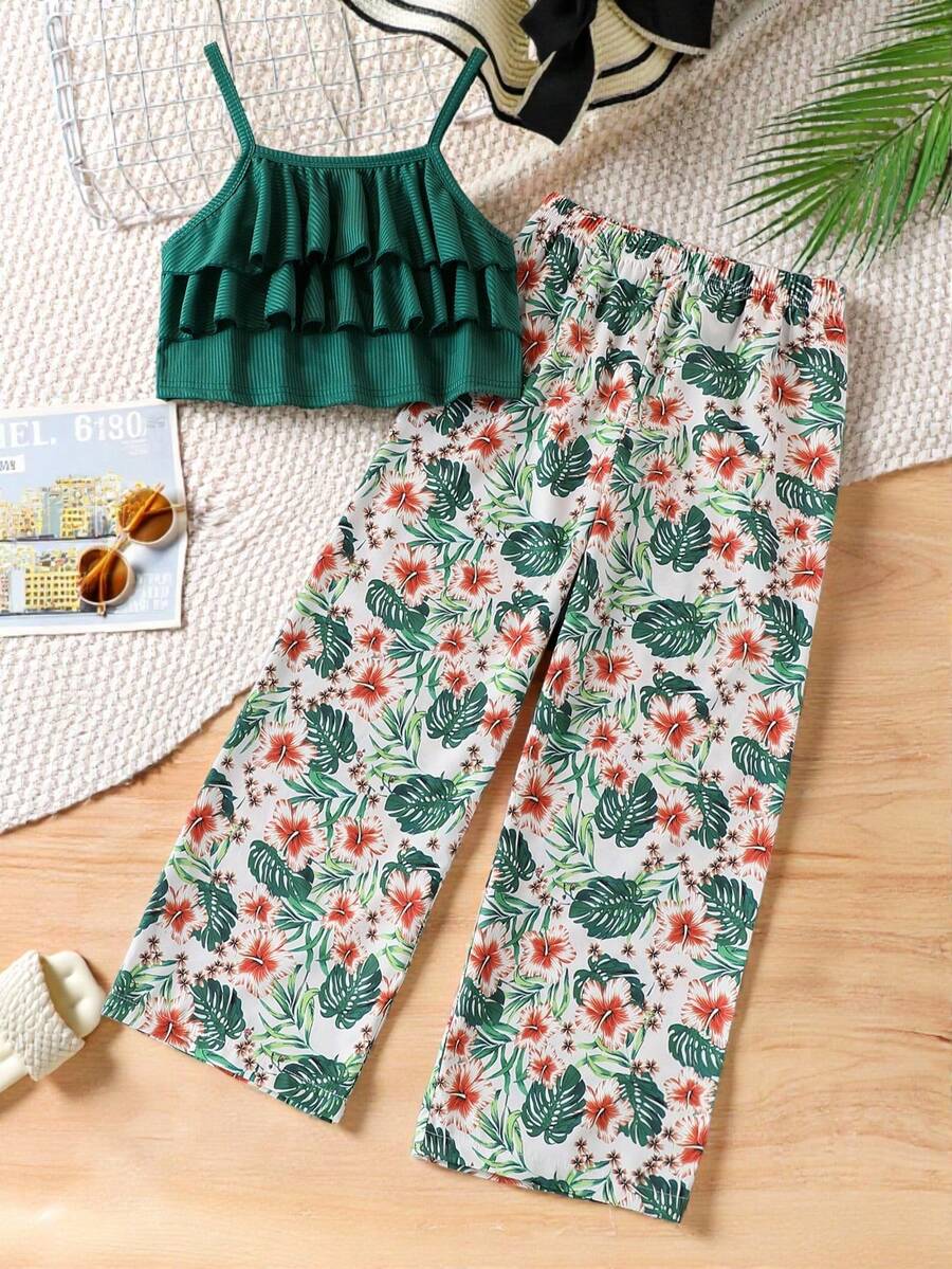 Tween girls blue 2-piece vacation outfit set featuring a tiered ruffle spaghetti strap camisole and loose high-waist pants.