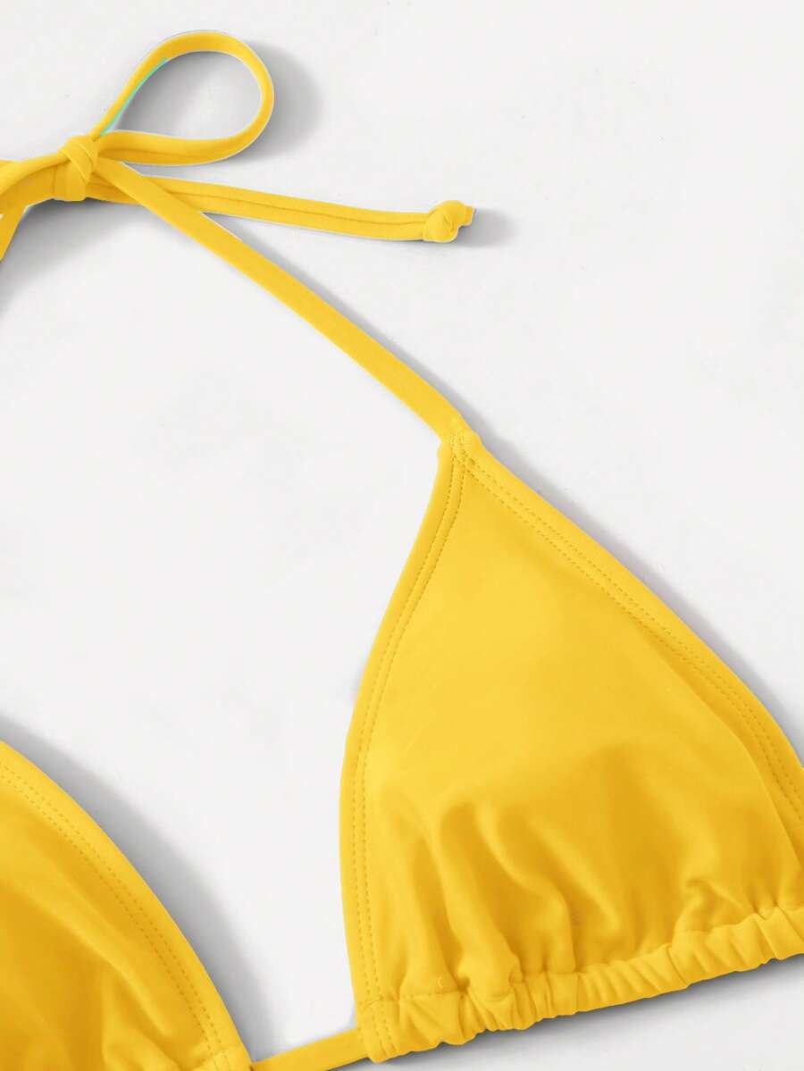 Women's high waist halter tie bikini swimwear set featuring triangle cups, wireless bra with removable padding, and tie side bottoms.