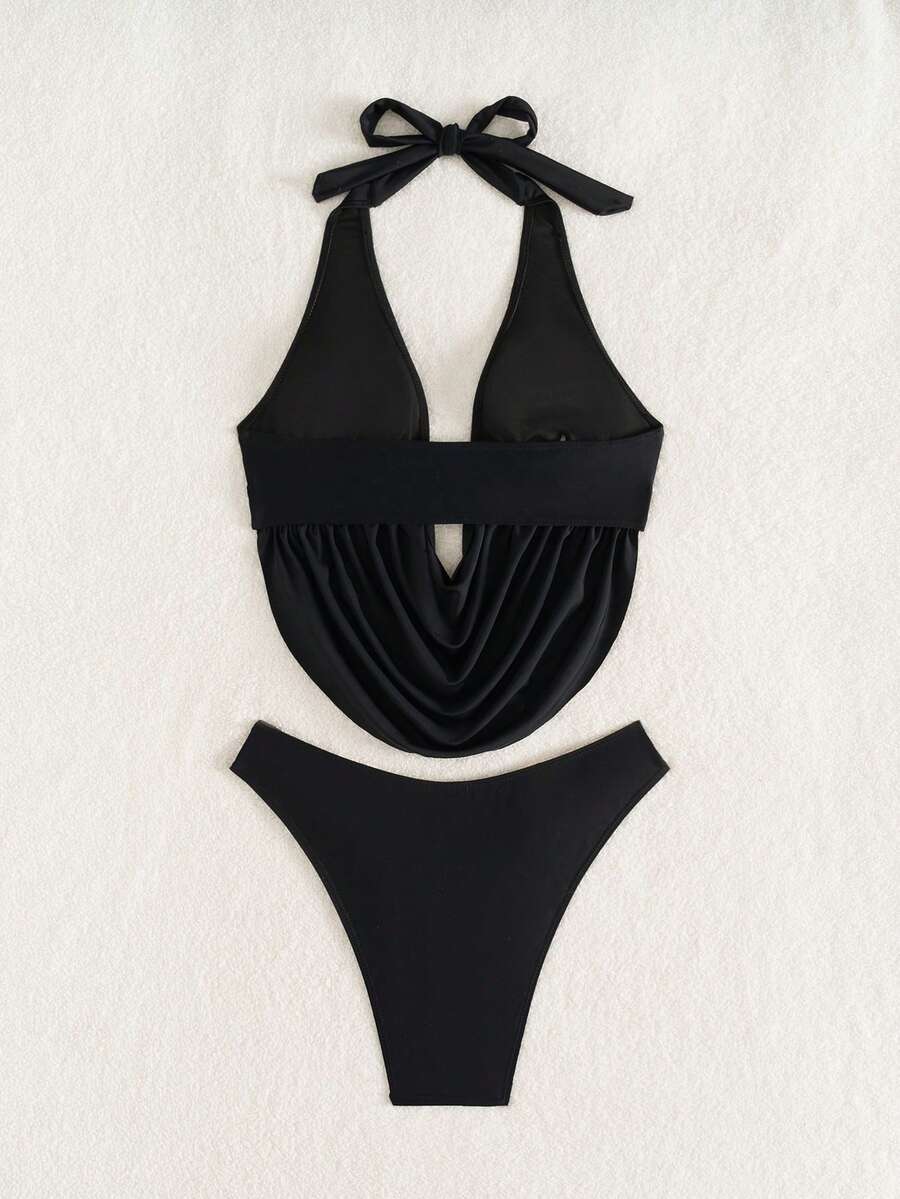 Women's 2-piece bikini set featuring a black deep V-neck lace-up crop top and high cut bikini bottom for beach and vacation wear.