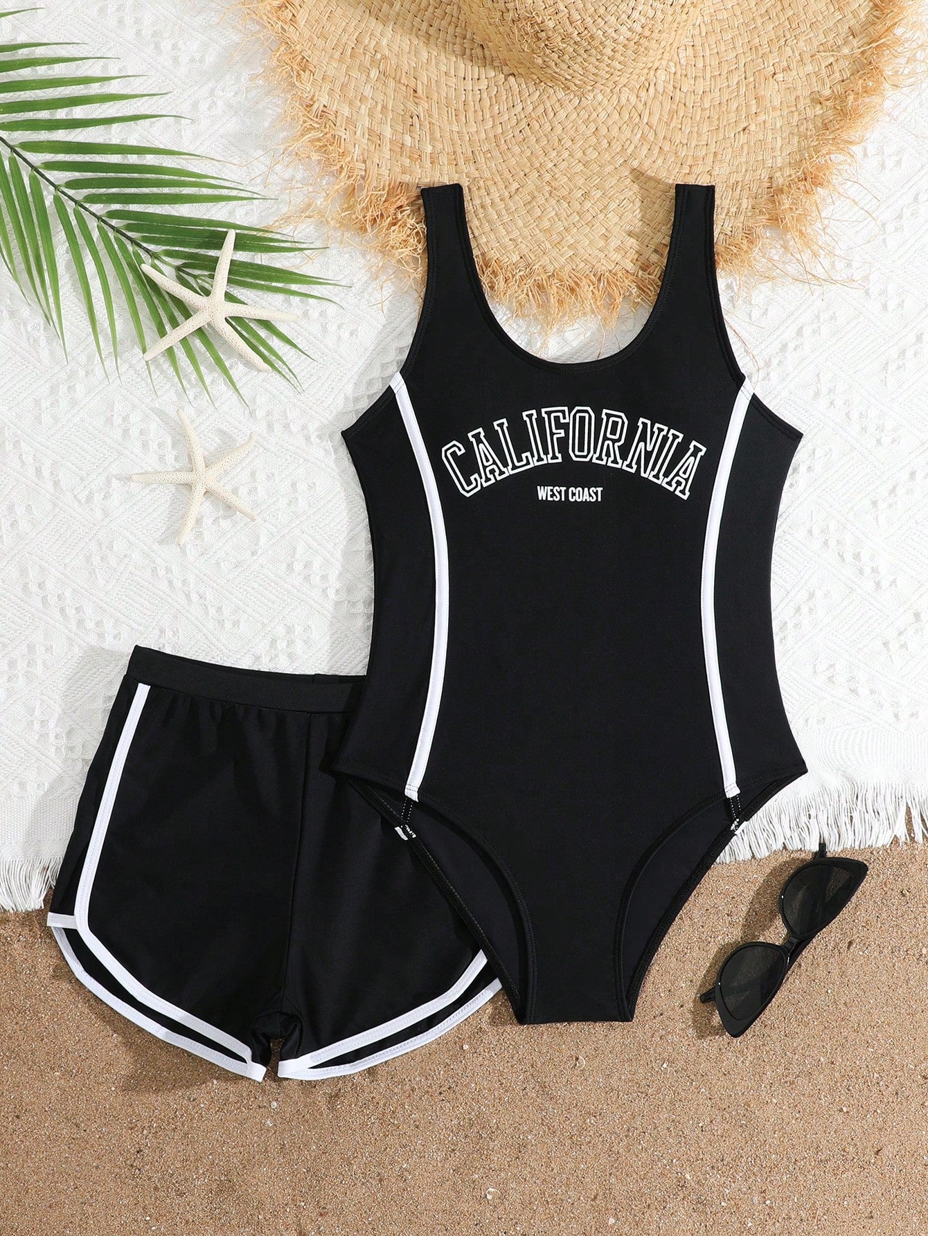 Girls baby blue striped 2-piece swimsuit set with sleeveless scoop neck one-piece, contrast piping, and matching swim shorts for beach and pool wear.