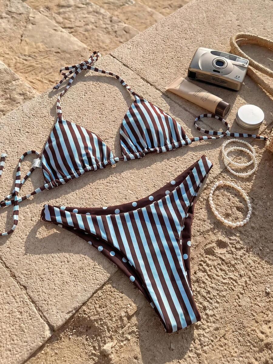 Women's two-piece halter bikini set featuring high cut thong bottoms and removable padding