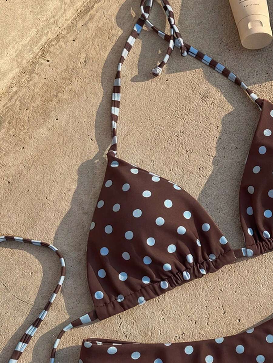 Women's two-piece halter bikini set featuring high cut thong bottoms and removable padding