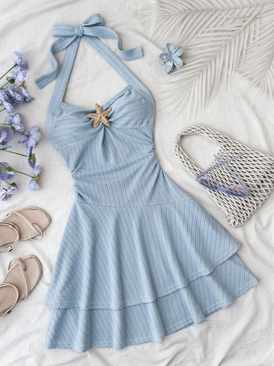 Tween girl summer dress in blue with striped pattern, halter neckline, tie front, sleeveless slim fit, high waist, and tiered ruffle hem for beach vacation and casual holiday wear.