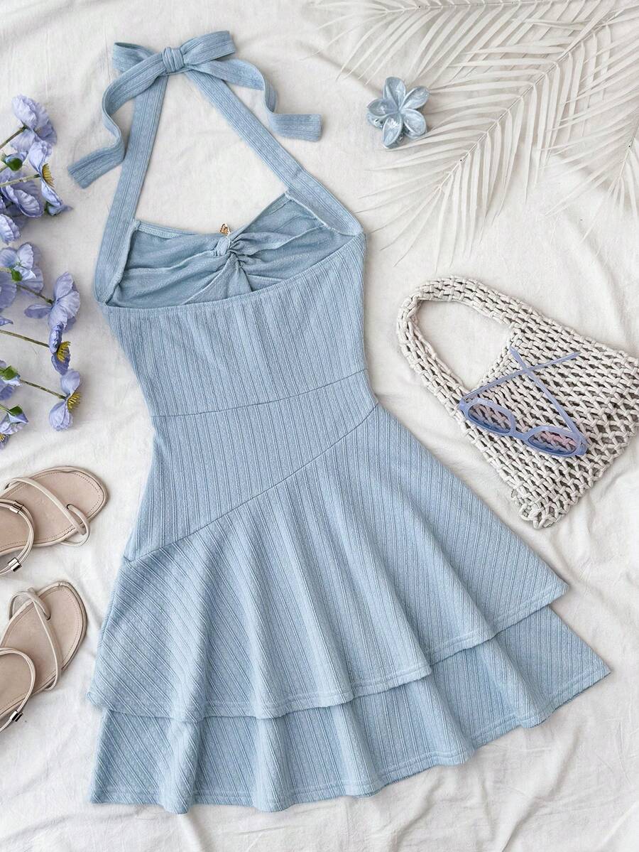Tween girl summer dress in blue with striped pattern, halter neckline, tie front, sleeveless slim fit, high waist, and tiered ruffle hem for beach vacation and casual holiday wear.