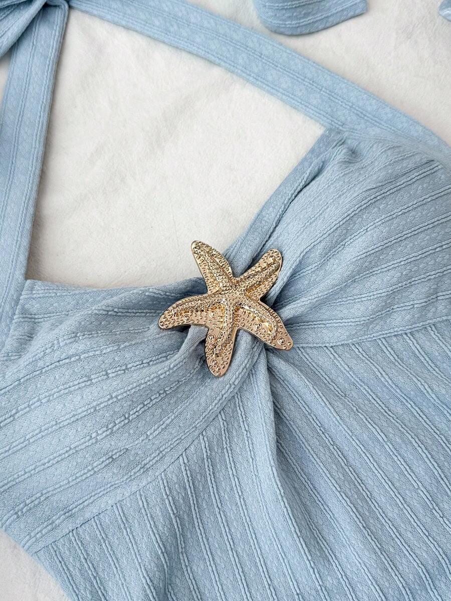 Tween girl summer dress in blue with striped pattern, halter neckline, tie front, sleeveless slim fit, high waist, and tiered ruffle hem for beach vacation and casual holiday wear.