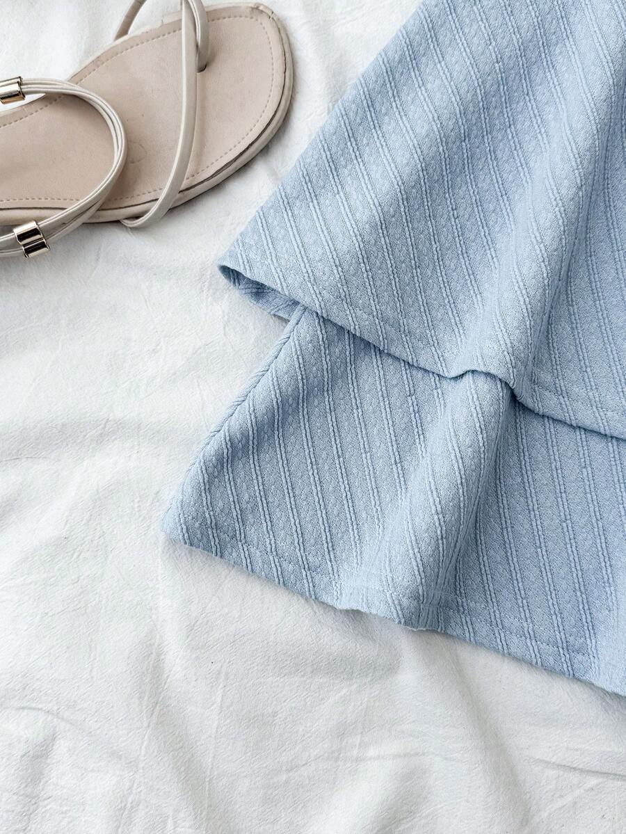 Tween girl summer dress in blue with striped pattern, halter neckline, tie front, sleeveless slim fit, high waist, and tiered ruffle hem for beach vacation and casual holiday wear.