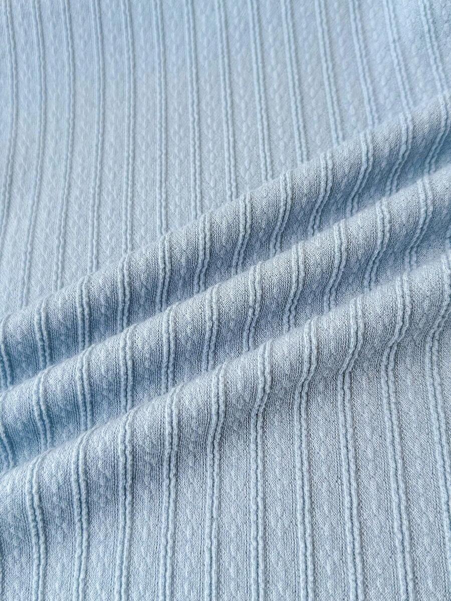 Tween girl summer dress in blue with striped pattern, halter neckline, tie front, sleeveless slim fit, high waist, and tiered ruffle hem for beach vacation and casual holiday wear.