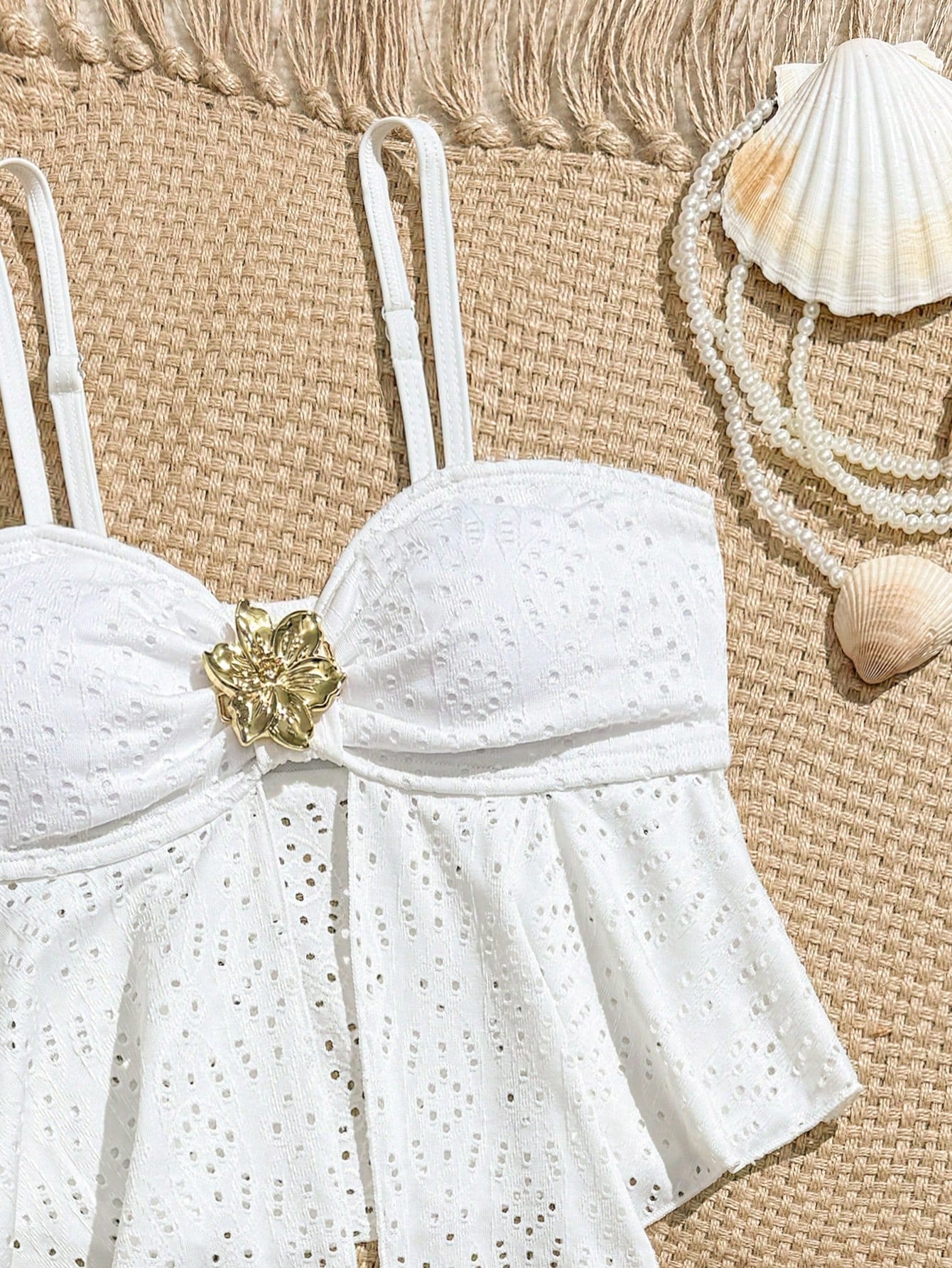 Tween girls 2-piece tankini swimwear set in apricot with a textured jacquard look, asymmetrical spaghetti-strap sleeveless top, and matching mid-waist short bikini bottoms.