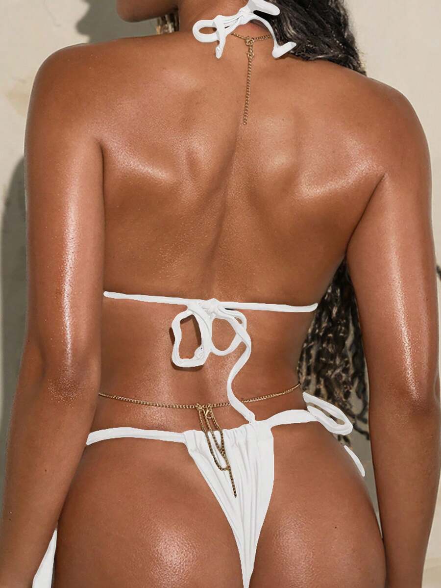 Army green high waist micro bikini swimsuit set for women featuring wireless spaghetti strap top with chain knot details and tie side thong bottoms.