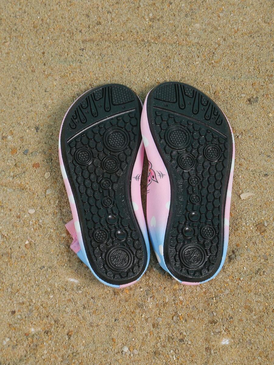 Pink kids quick-dry slip-on water shoes with breathable upper and non-slip TPR outsole.