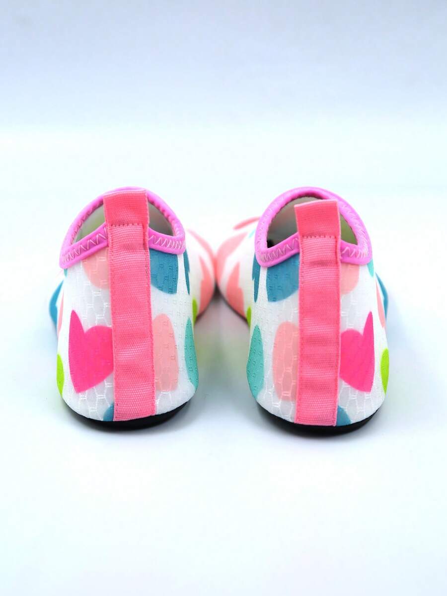 Kids slip-on aqua socks water shoes with breathable polyester upper and non-slip wear-resistant TPR outsole for boys and girls.