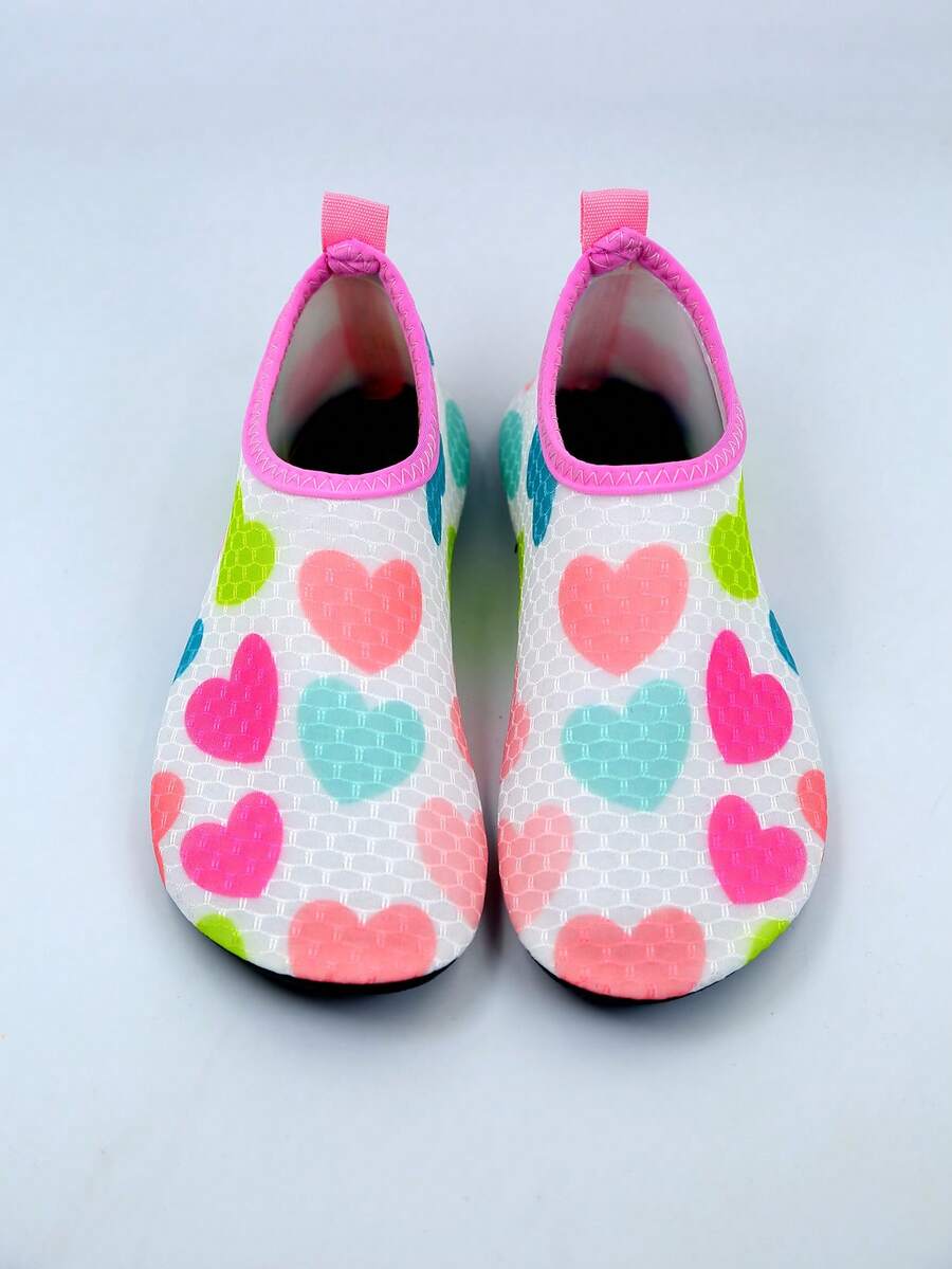 Kids slip-on aqua socks water shoes with breathable polyester upper and non-slip wear-resistant TPR outsole for boys and girls.