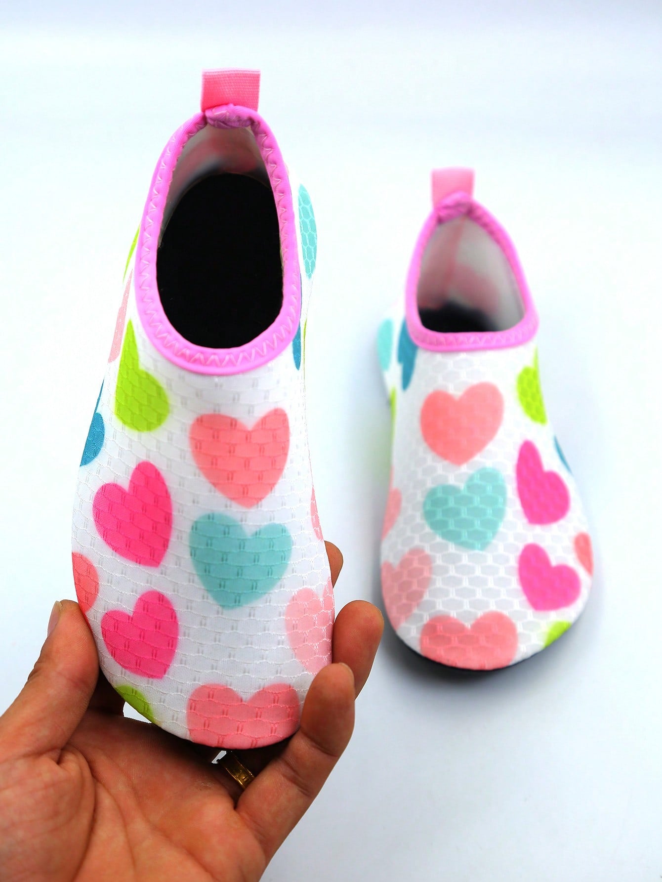 Kids slip-on aqua socks water shoes with breathable polyester upper and non-slip wear-resistant TPR outsole for boys and girls.