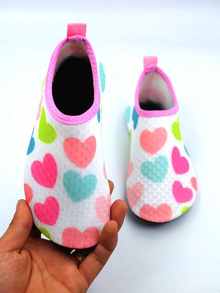 Kids slip-on aqua socks water shoes with breathable polyester upper and non-slip wear-resistant TPR outsole for boys and girls.