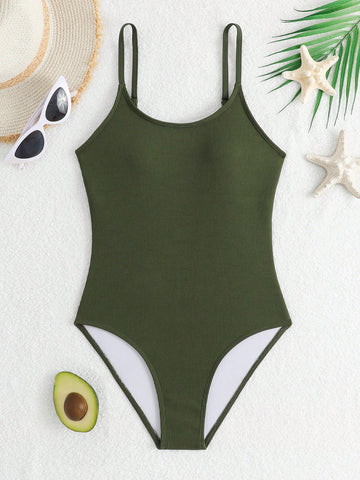 Purple rib knit one-piece swimsuit for tween girls with spaghetti straps, fitted shape, mid-waist bottom, wireless bra, and lined body.