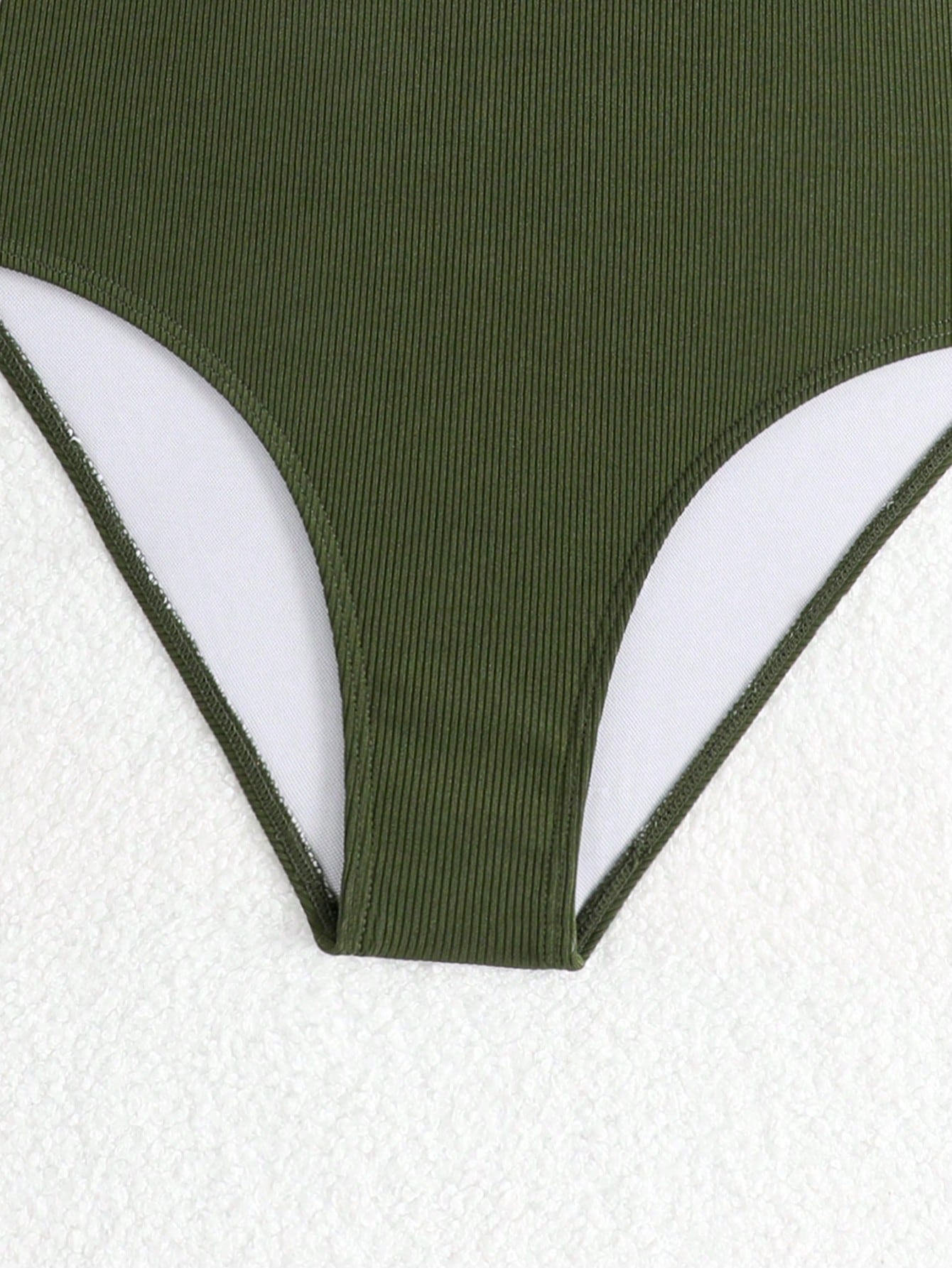 White tween girls one-piece swimsuit with V-neck, cutout detail, appliques, plant pattern, mid-waist bottom, and lined body for beach or swimming