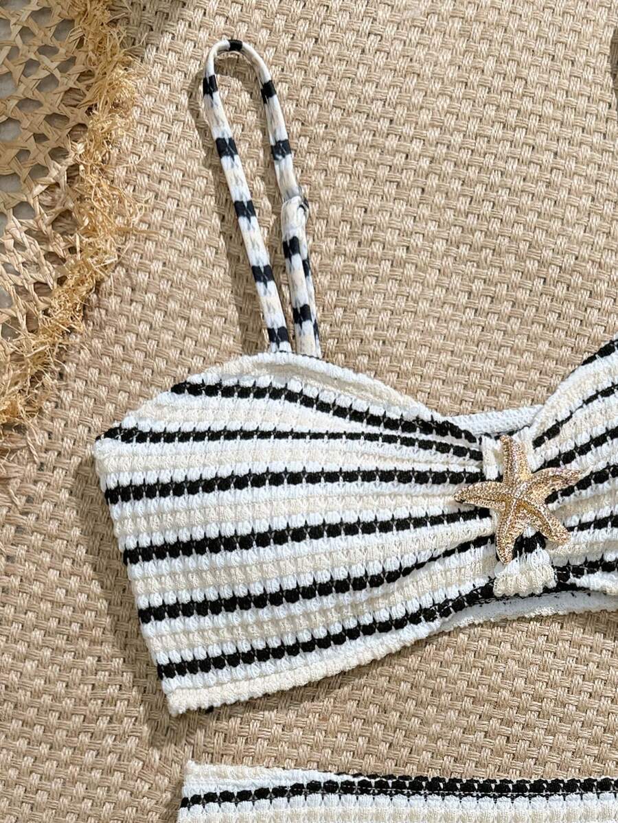 Tween girls pink and white striped two-piece bikini set with spaghetti strap bandeau top, starfish decor, and high waist swim bottoms for beach and vacation wear