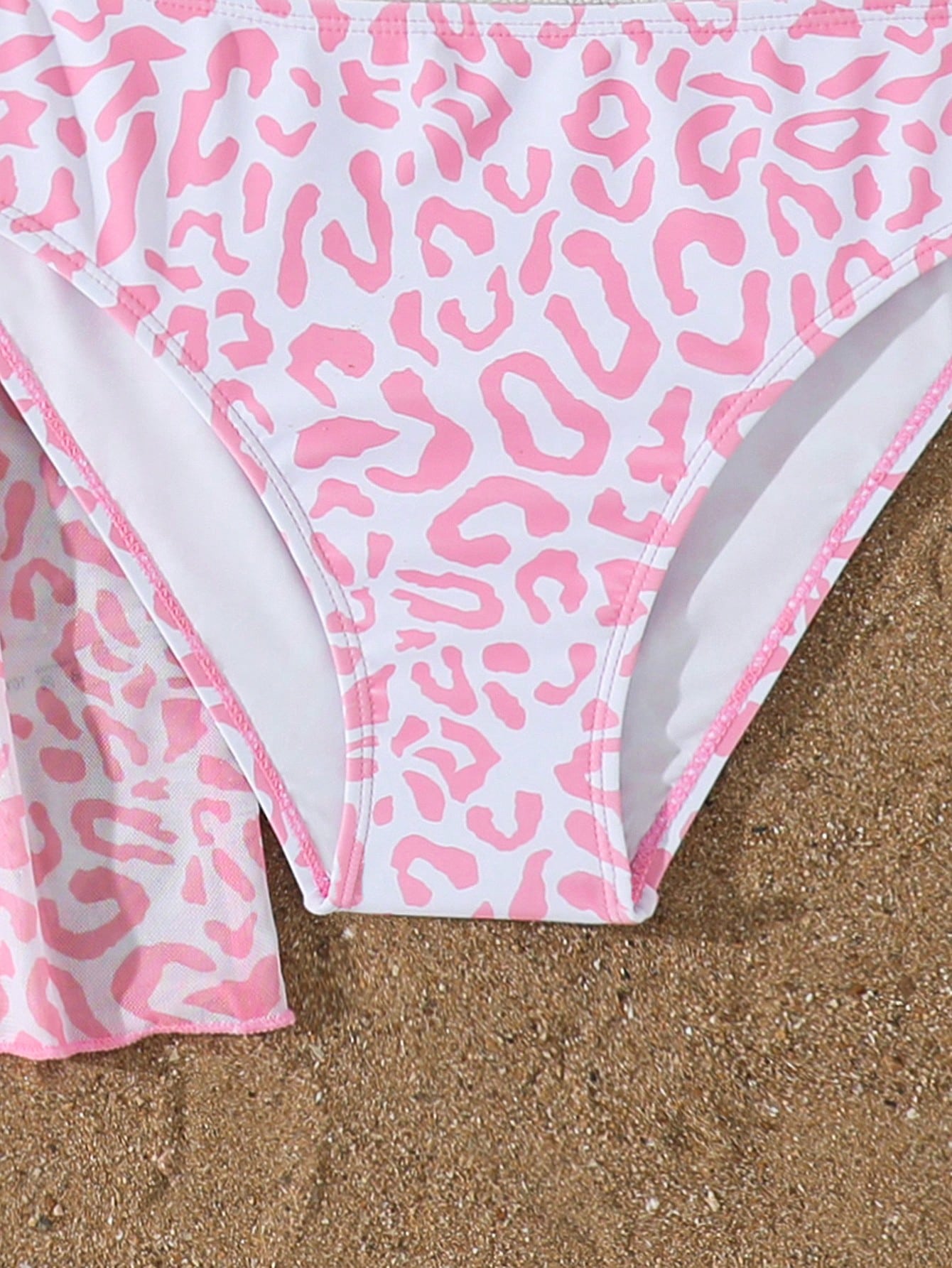 Tween girls 3-piece striped swimwear set featuring a tankini top, mid-waist bikini bottoms with a drawstring waist, and a matching kimono cover-up for beach or vacation wear.