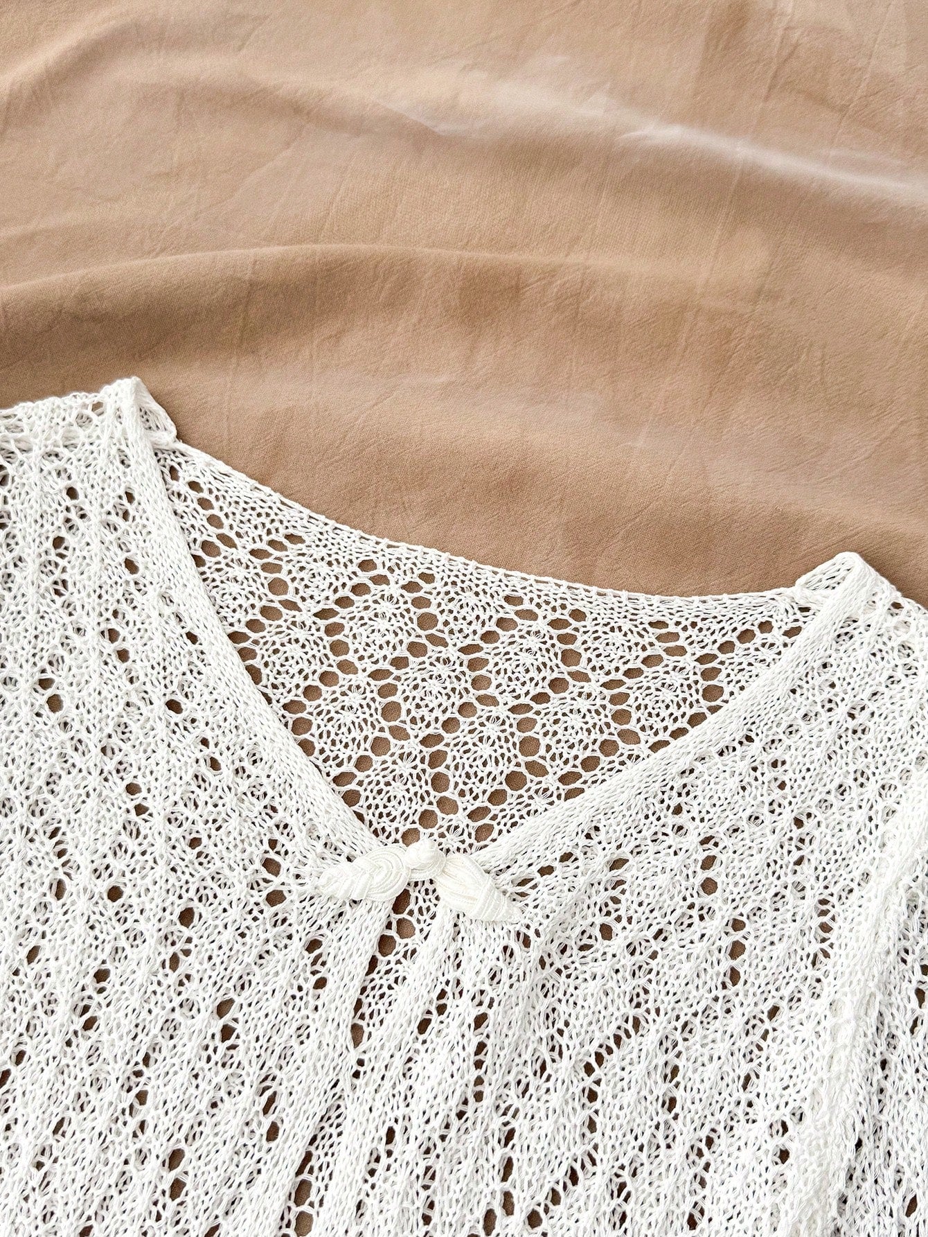 Tween girls semi-sheer white cover-up dress with V-neckline, long sleeves, contrast lace details, and zipper accent for beachwear layering.