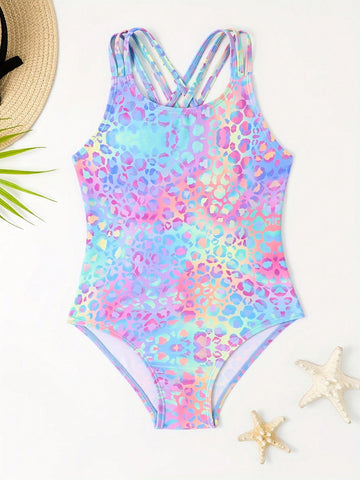 Girls' multicolor ombre leopard print one-piece swimsuit with scoop neck, ruffle detail, and criss-cross back design for summer pool wear.